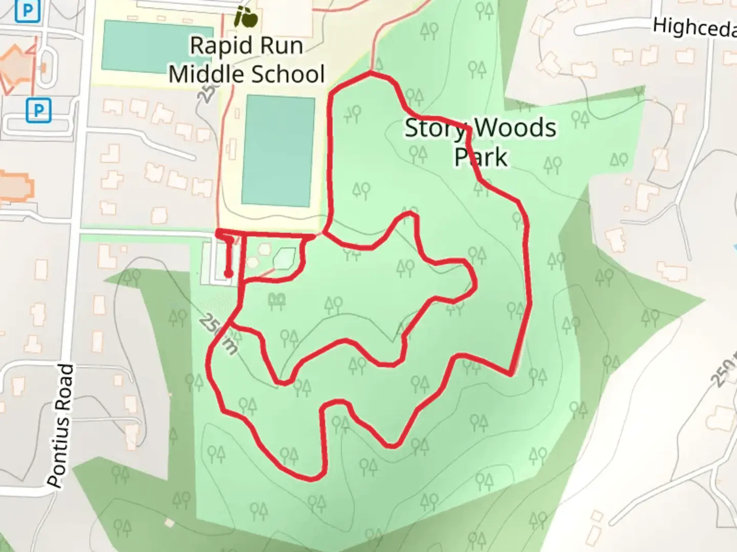 An image depicting the trail Story Woods Park Loop and its surrounding area.