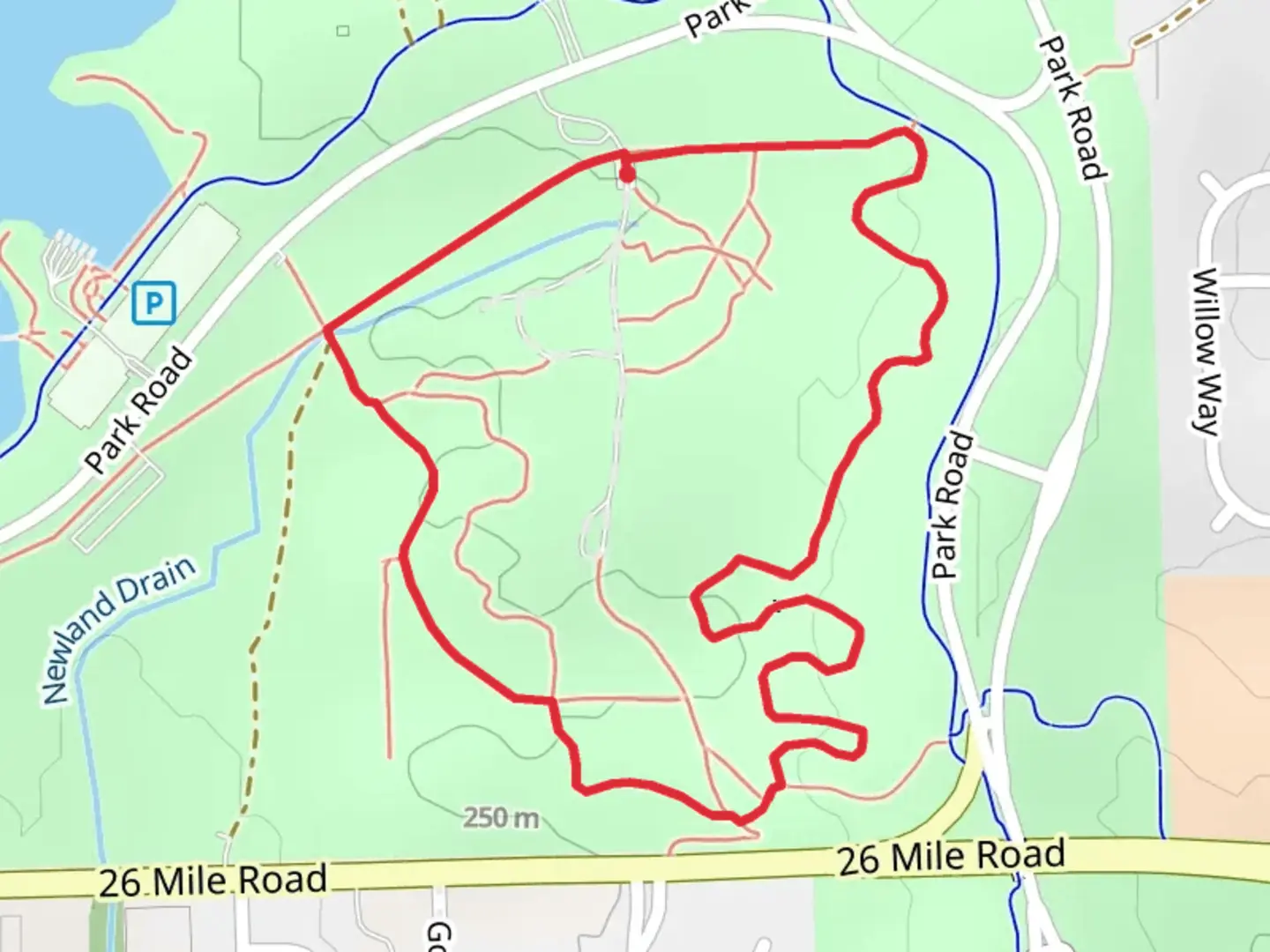 An image depicting the trail Stony Creek Metropark Trolly Loop Trail and its surrounding area.