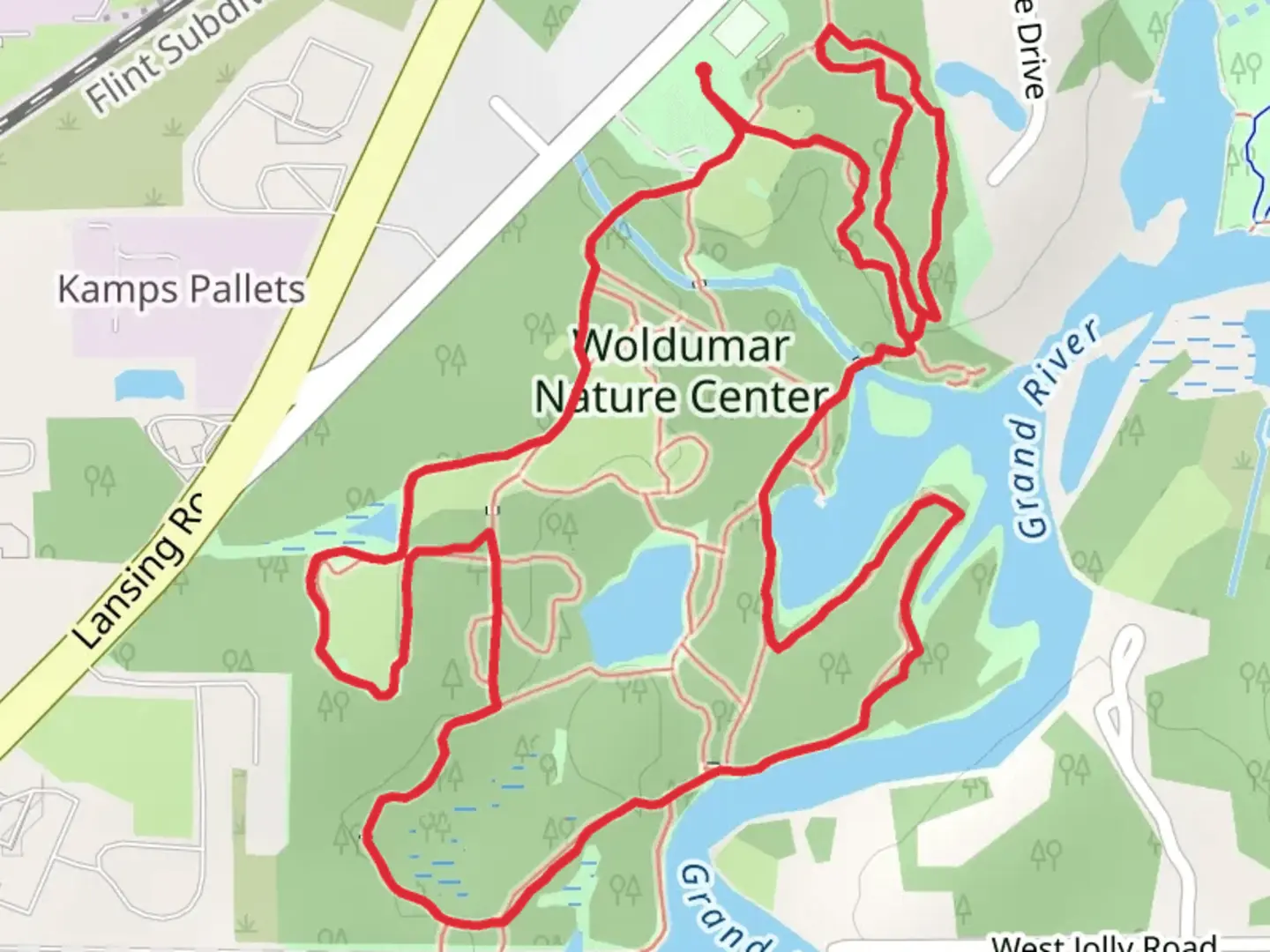 An image depicting the trail Woldumar Nature Center Loop and its surrounding area.