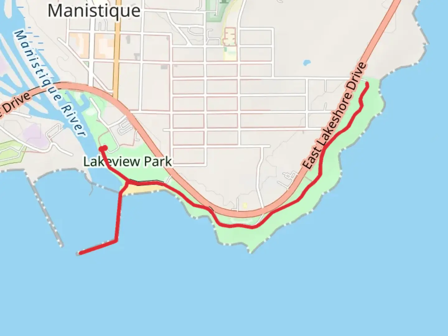 An image depicting the trail Manistique Boardwalk and its surrounding area.