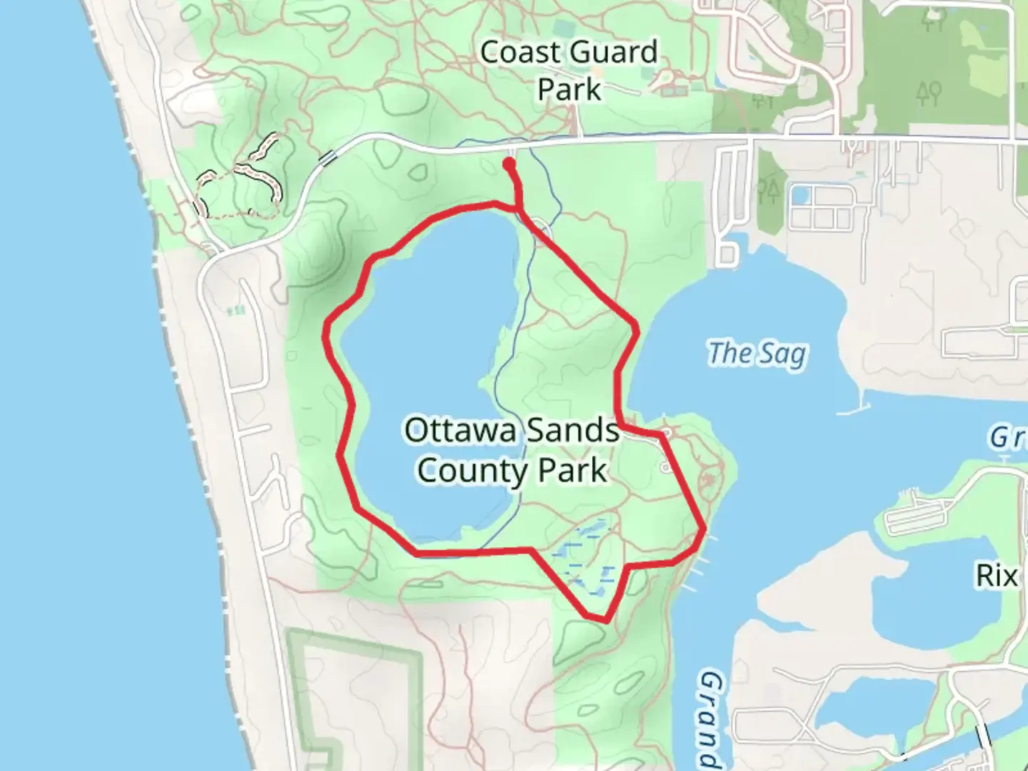 An image depicting the trail Ottawa Sands County Park Loop and its surrounding area.