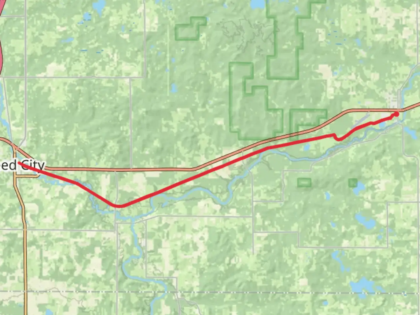 An image depicting the trail Pere Marquette State Trail and its surrounding area.