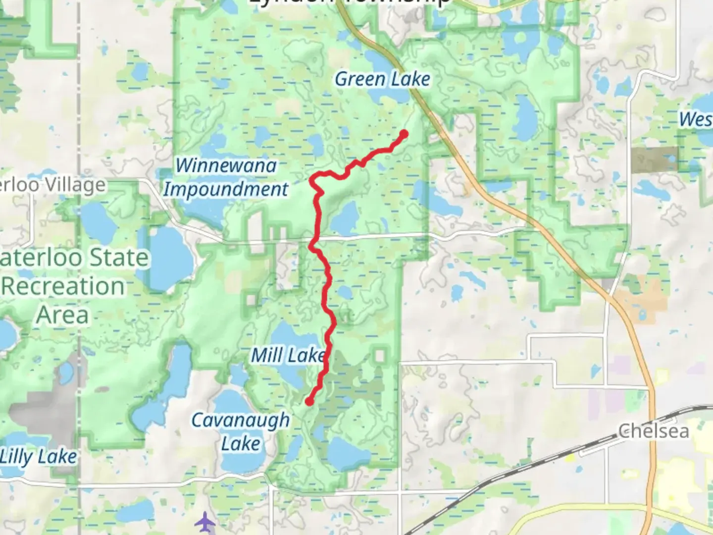 An image depicting the trail Waterloo-Pinckney Trail from Mill Lake and its surrounding area.