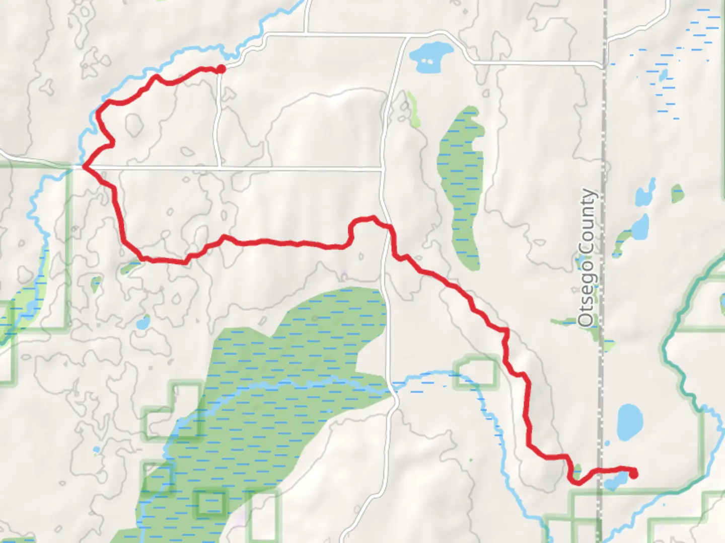 An image depicting the trail Shingle Mill Pathway to Town Corner Lake and its surrounding area.