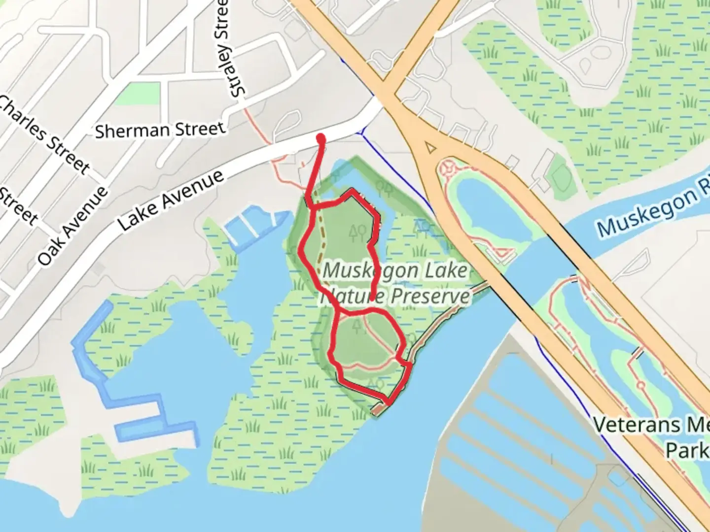 An image depicting the trail Muskegon Lake Nature Preserve Loop Trail and its surrounding area.
