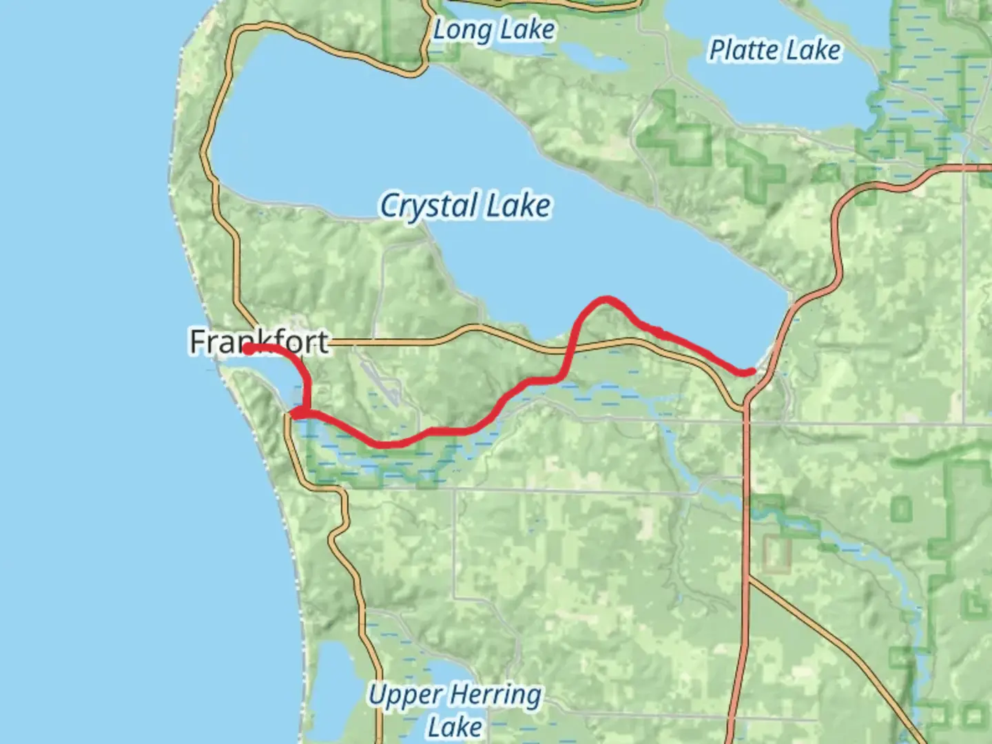 An image depicting the trail Betsie Lake via Betsie Valley Trail and its surrounding area.