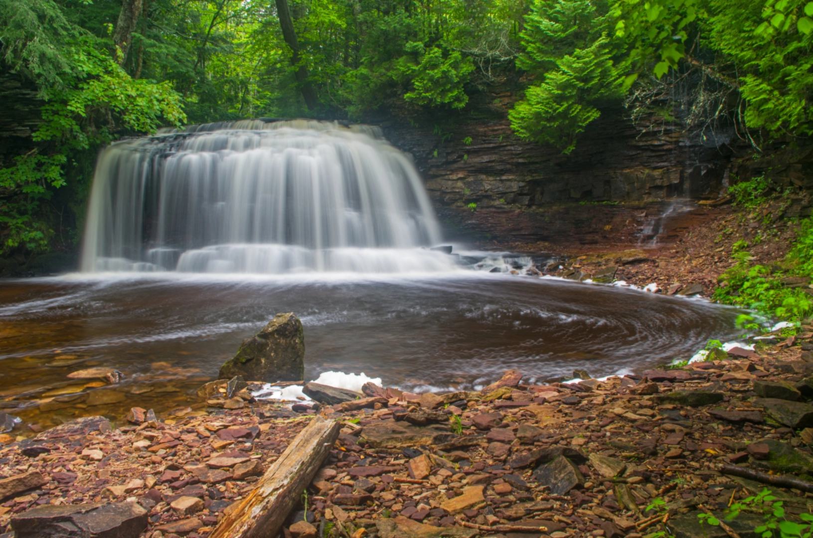 An image depicting the trail Rock River Falls Hike and its surrounding area.