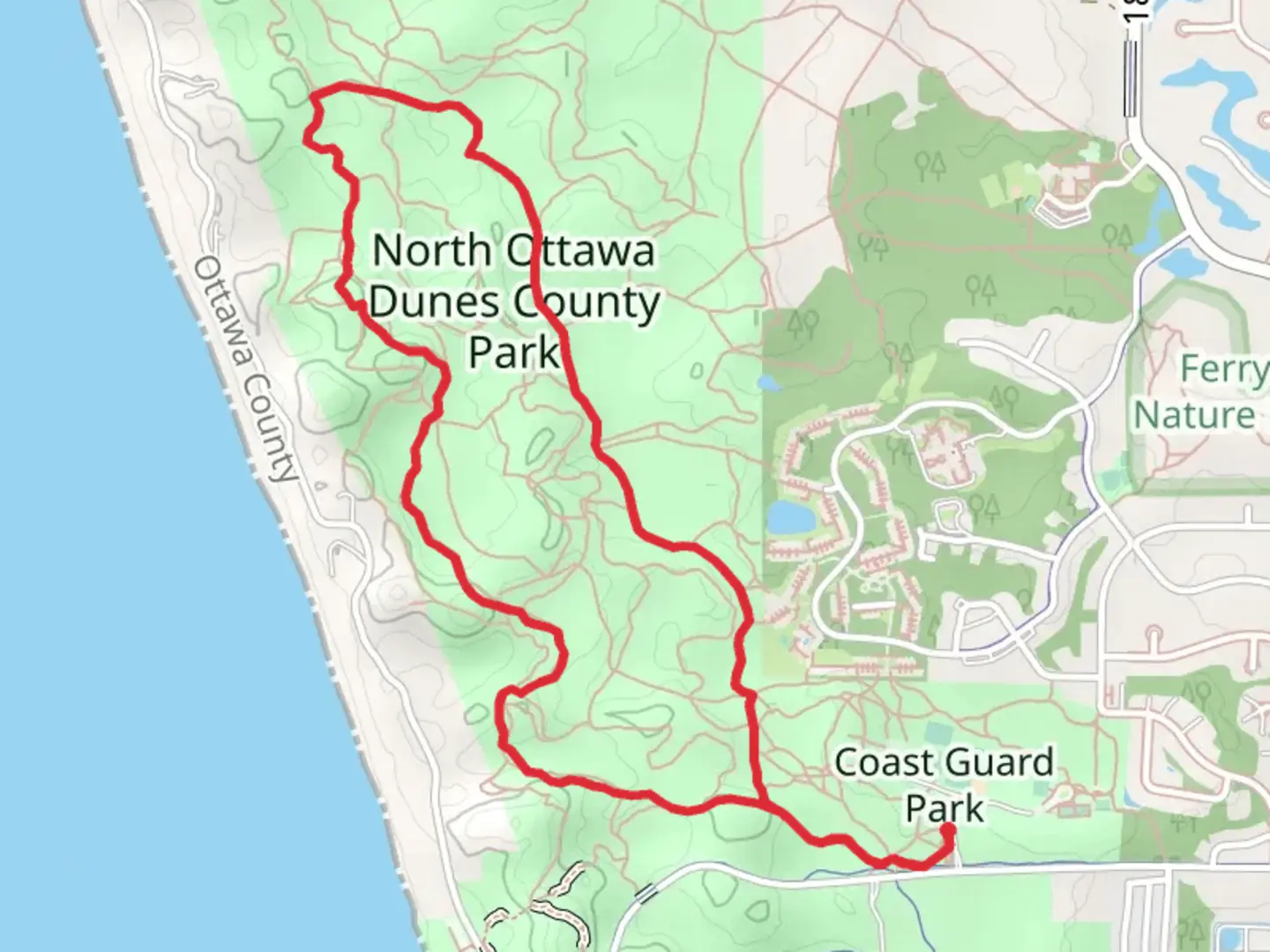 An image depicting the trail North Ottawa Dunes County Park Loop and its surrounding area.