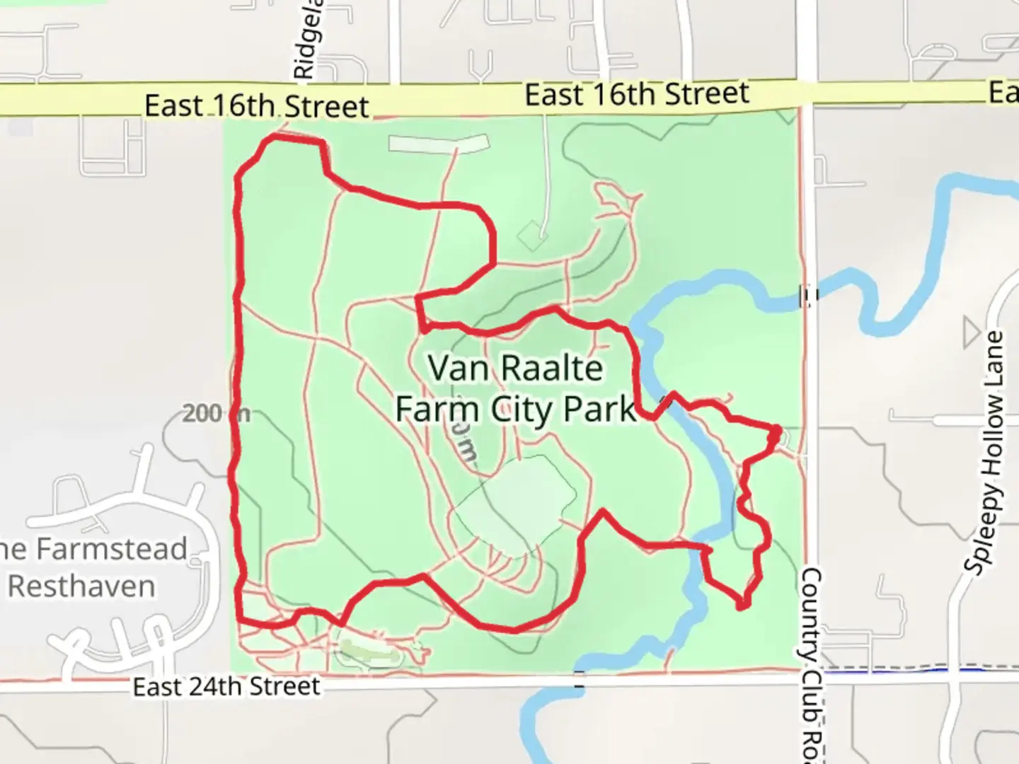 An image depicting the trail Van Raalte Farm City Park Loop and its surrounding area.