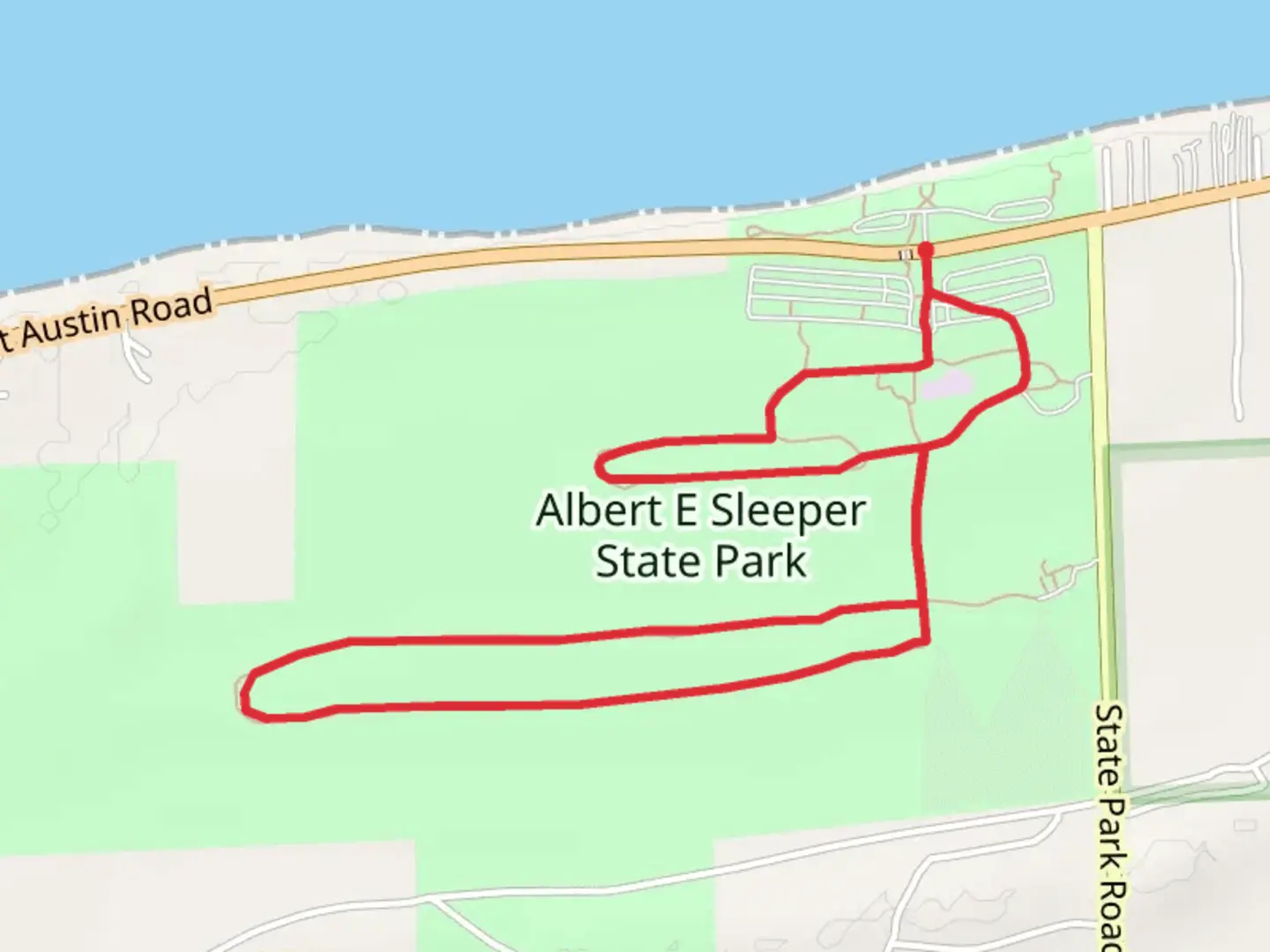 An image depicting the trail Albert E Sleeper State Park Loop and its surrounding area.