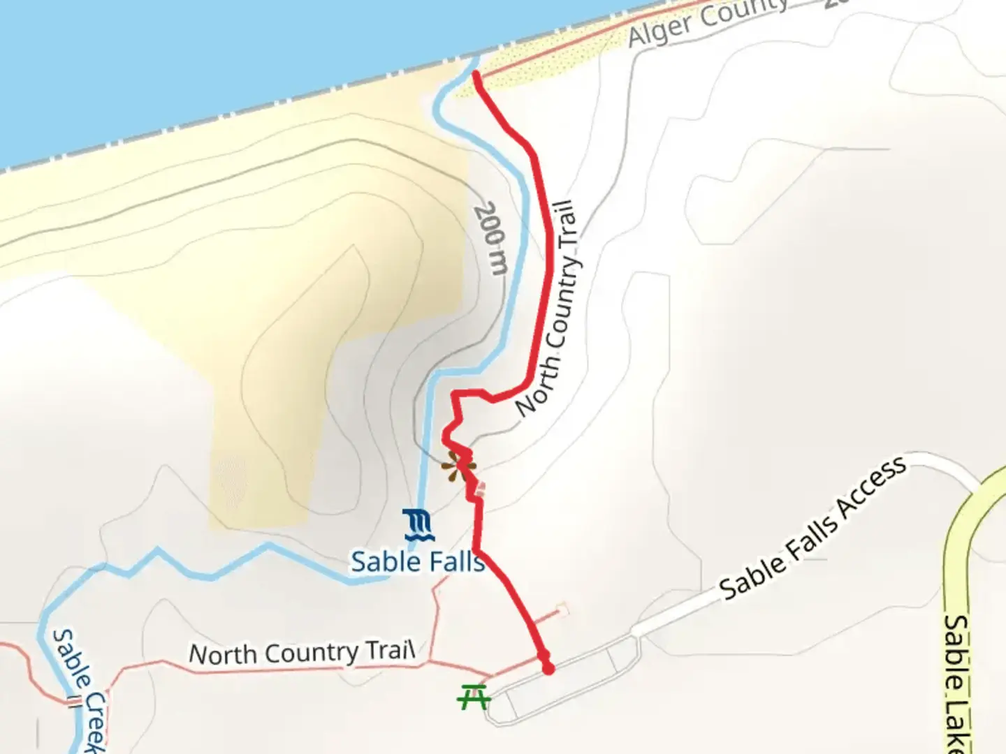 An image depicting the trail Sable Creek via North Country Trail and its surrounding area.